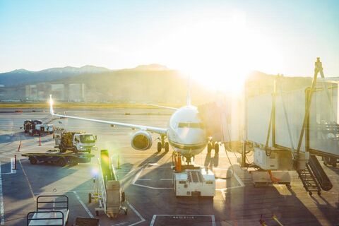 Aircraft being loaded on the apron at dawn